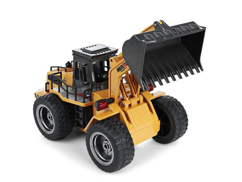Радиоуправляемый фронтальный погрузчик Huina RC Wheeled Loader 1:14 2.4GHz RTR (HN1583) (нажмите для увеличения) Радиоуправляемый фронтальный погрузчик Huina RC Wheeled Loader 1:14 2.4GHz RTR (HN1583) (нажмите для увеличения)
