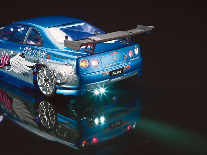 Nissan Skyline GT-R ZTune Sparrowhawk DX Blue 2.4GHz (TTR6534-F74) (нажмите для увеличения) Nissan Skyline GT-R ZTune Sparrowhawk DX Blue 2.4GHz (TTR6534-F74) (нажмите для увеличения)